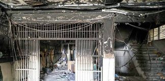 Iran prison fire death toll rises to 8 as protests continue